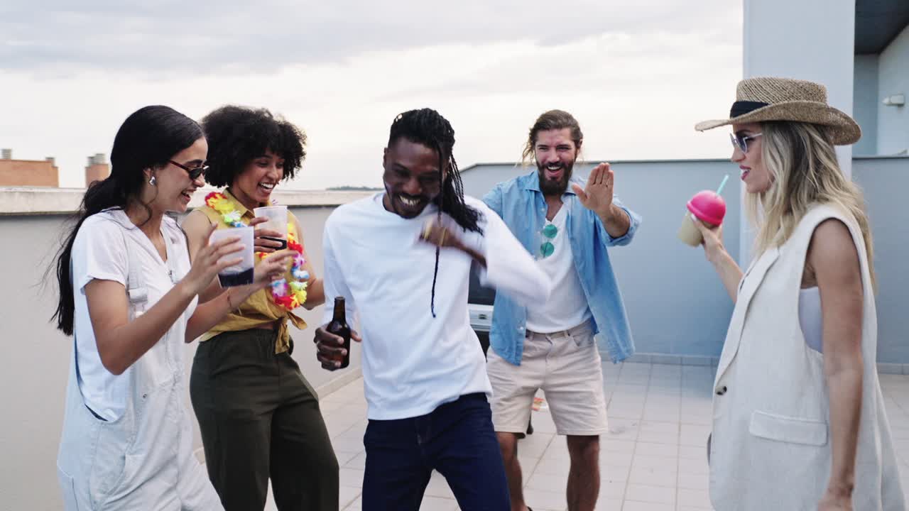 A group of friends celebrating and dancing at a party