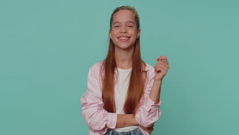 girl raises thumbs up agrees or gives positive reply recommends advertisement likes good, approve