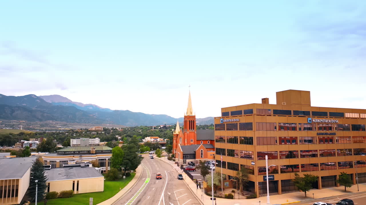 Colorado Springs, USA, 22 July 2025: Distancing from a beautiful building of St. Mary's Cathedral with golden steeples. Prominent religious site of Colorado Springs, Colorado, USA