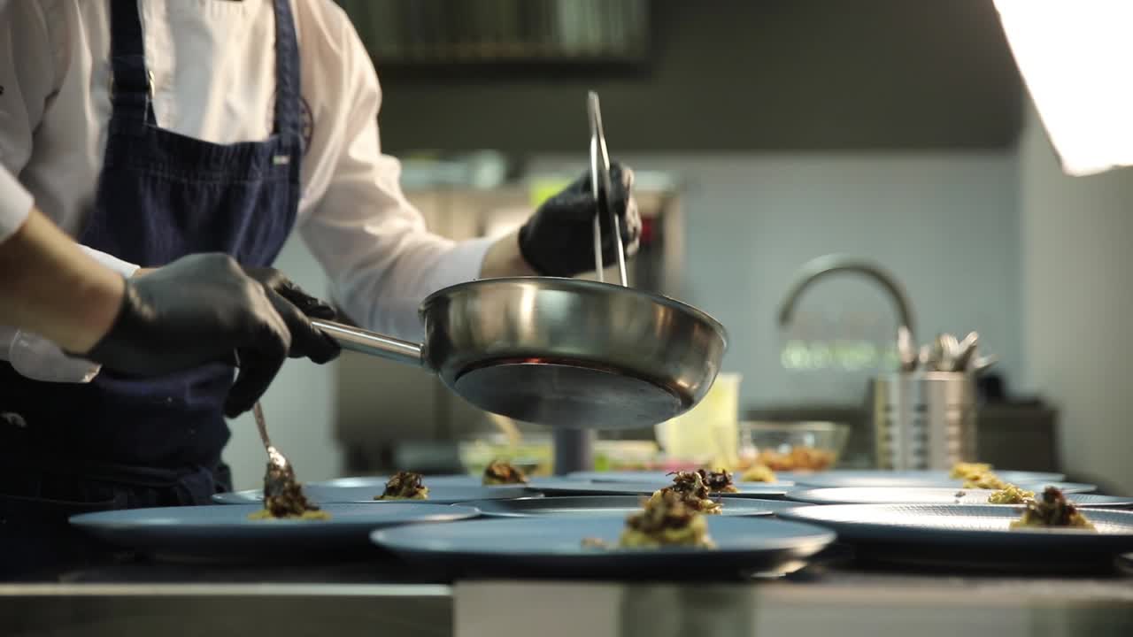 Chef Preparing Food in a Restaurant Kitchen