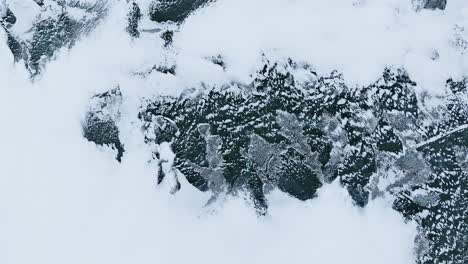 drone shot flying over iced over lake michigan