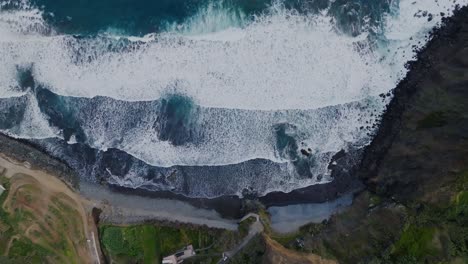 the ocean waves hits the seaside - fly over