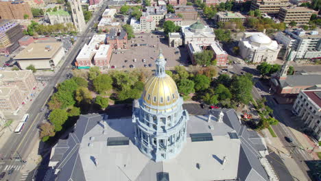 drone view of golden dome on top of the colorado state capital building