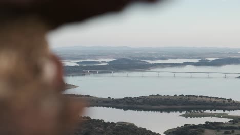 pan over monsaraz showing the bridge from portugal to spain