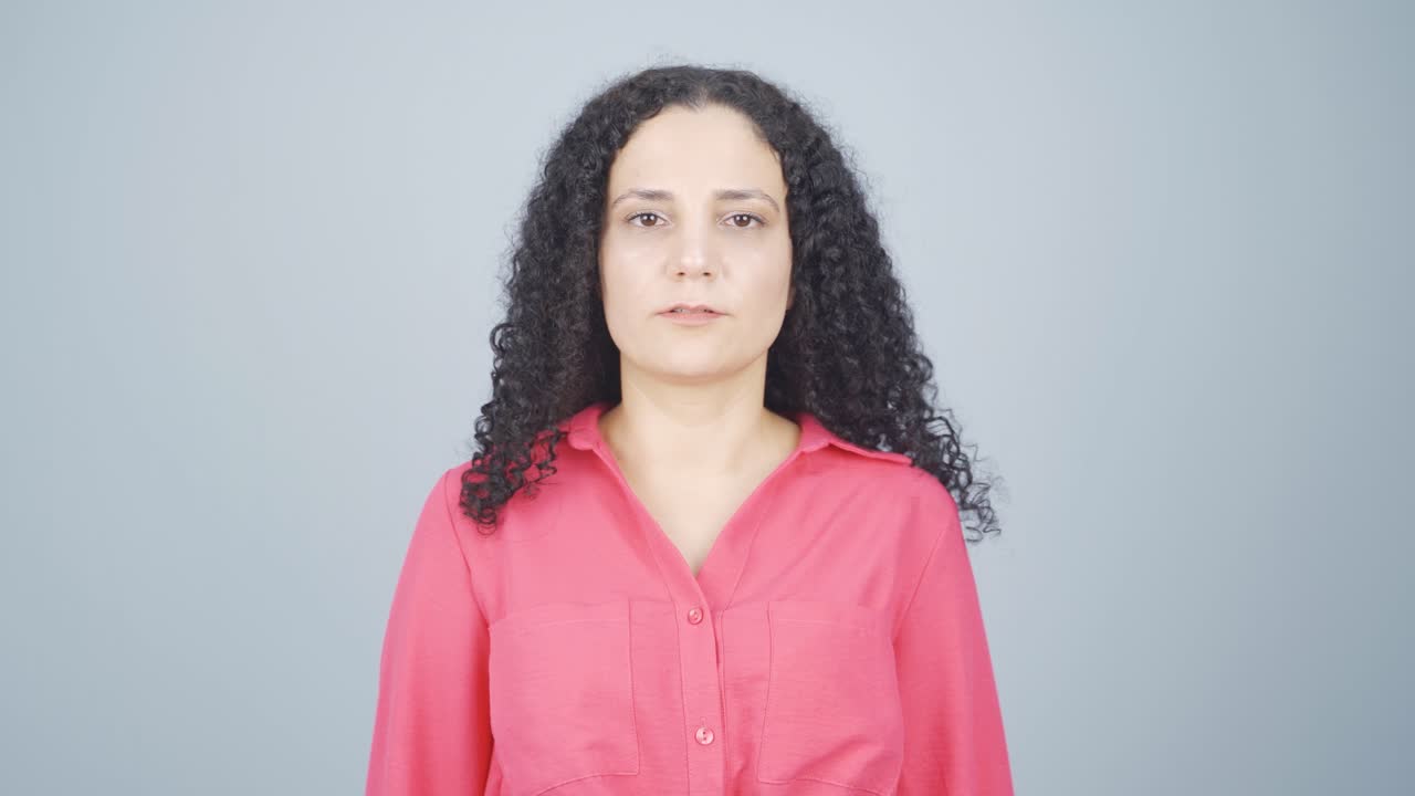 Young woman with wrinkles and problems on her skin is unhappy.