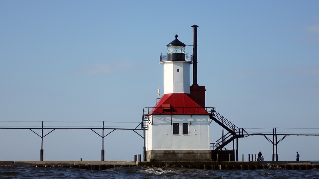 Beautiful white light house in a summer afternoon