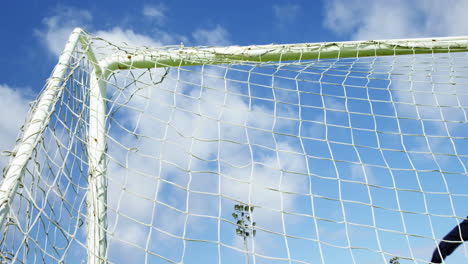 goalkeeper catching a soccer ball