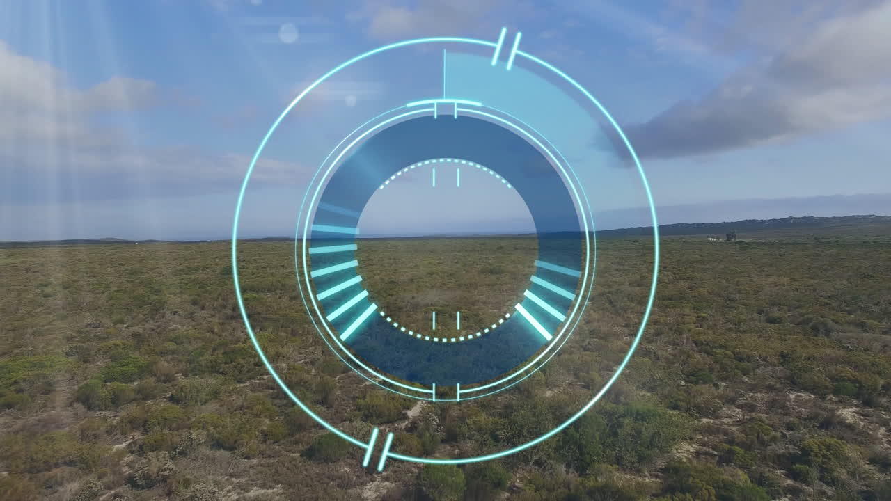 Digital interface animation over aerial view of expansive green landscape