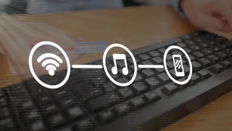 red de iconos de conexión contra la persona que posee una tarjeta de crédito escribiendo en el teclado de la computadora