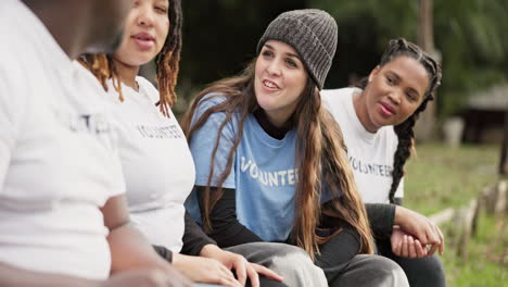 Outdoor,-volunteer-and-group-with-conversation