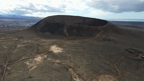 aerial shot of calderon hondo volcano in fuerteventura, canary islands