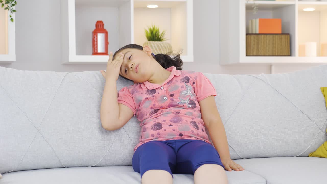 Tired and sick girl child.