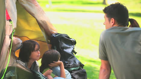 parents camping with their children