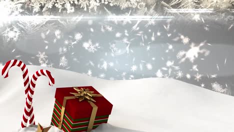 animation of snow falling over christmas candies and present on grey background