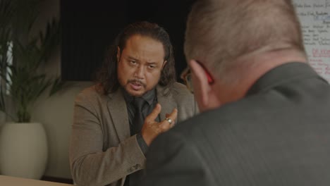 serious business meeting between two men