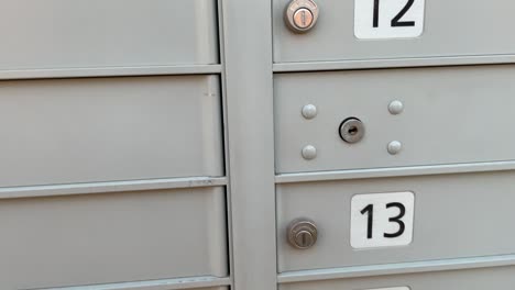 canadian post canada mail boxes courier close-up of mailboxes for sub urban community neighborhood for mailing and shipping letters, cards, and online shopping for receiving small items