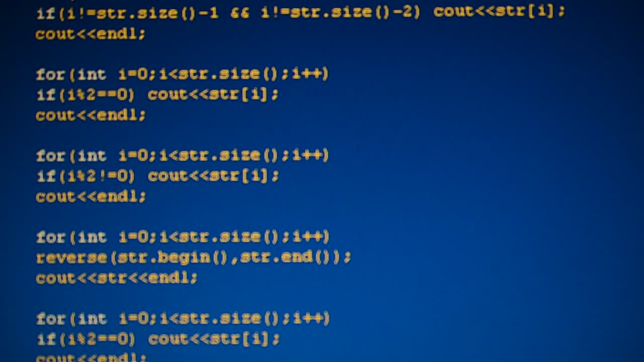 Source code on the monitor screen. Source code