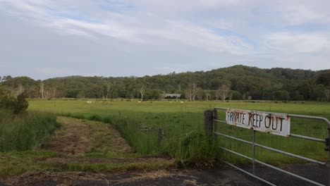 time-lapse of daylight changes over a fenced field