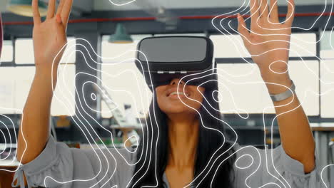 topography pattern against businesswoman wearing vr headset at office