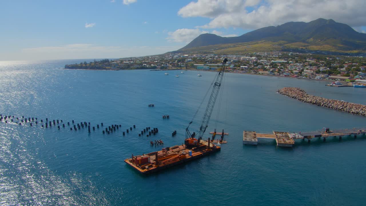 Dock being built in St Kitts Blue water.
