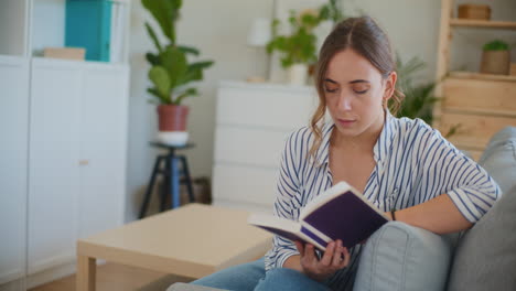 sad student studying alone at home