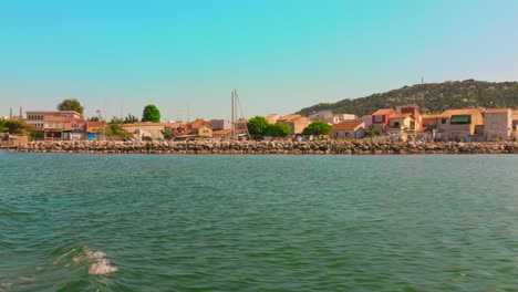 calm waters of etang de thau by sète under clear blue sky