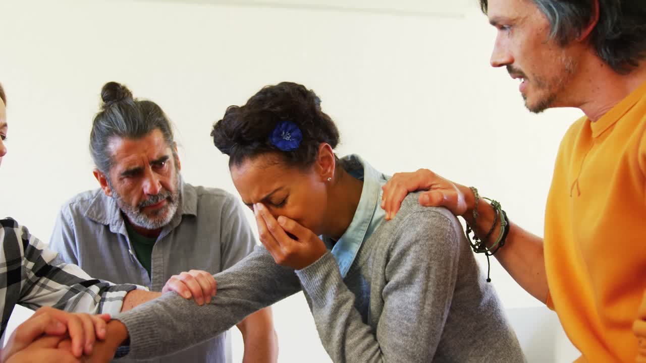 Artists consoling sad woman 4k