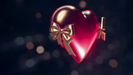 glossy red heart with golden ribbon and bokeh background