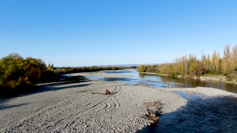 beautiful landscape of scenic wahione river in new zealand wilderness - aerial drone - copy space for text