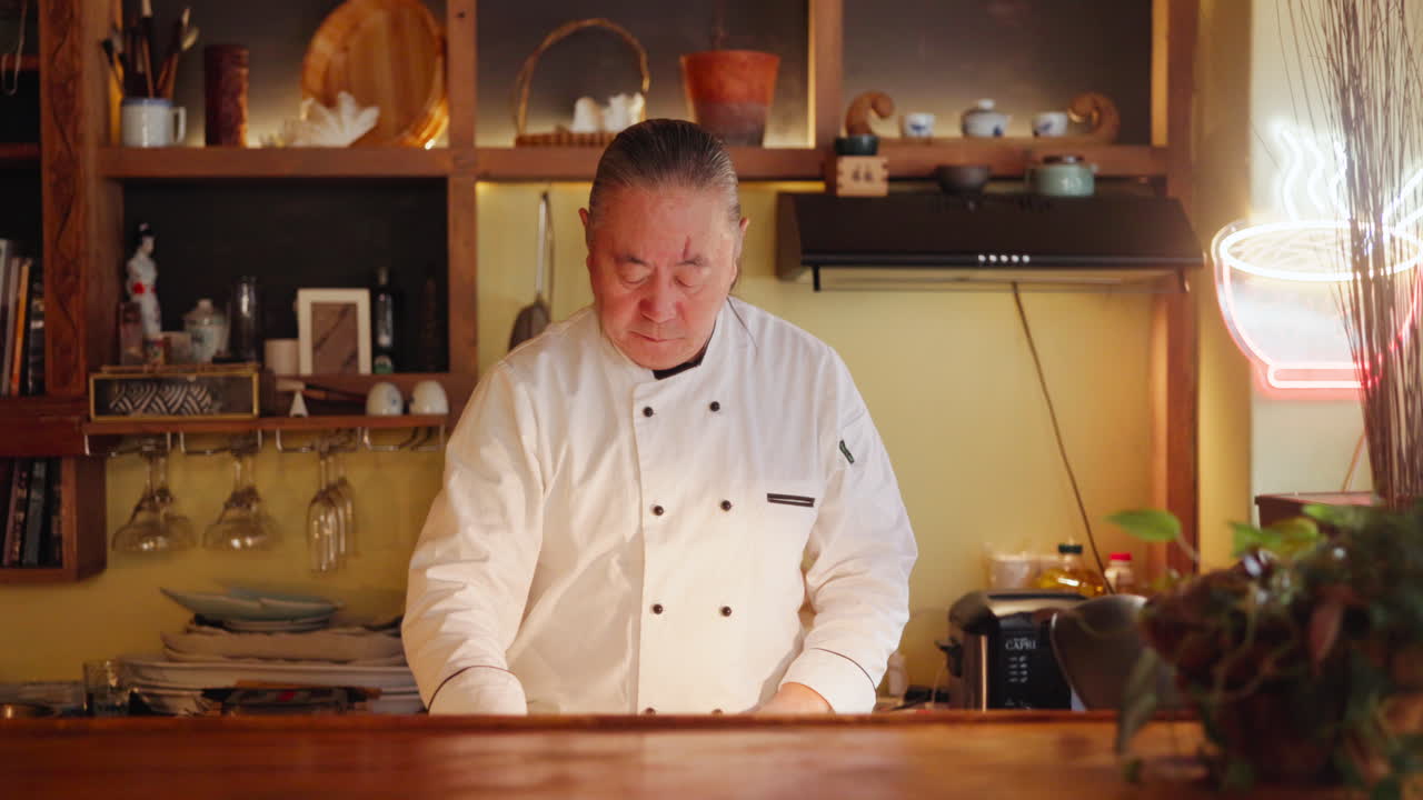 Chef in a Japanese Restaurant Kitchen