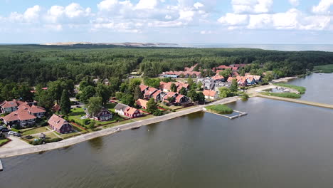 fly towards resort town of pervalka on sunny day in lithuania, neringa region