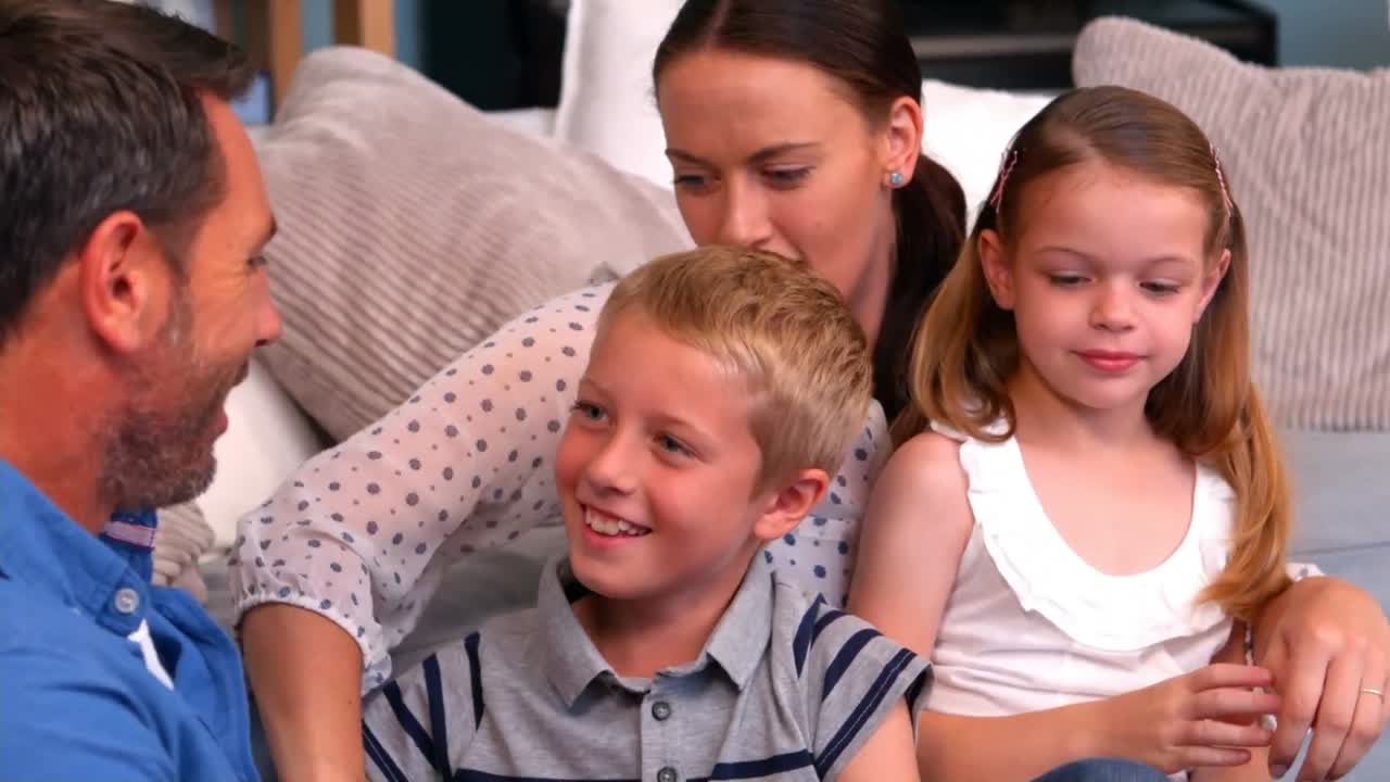 Family playing in living room