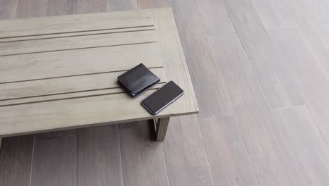 wallet and phone on a table