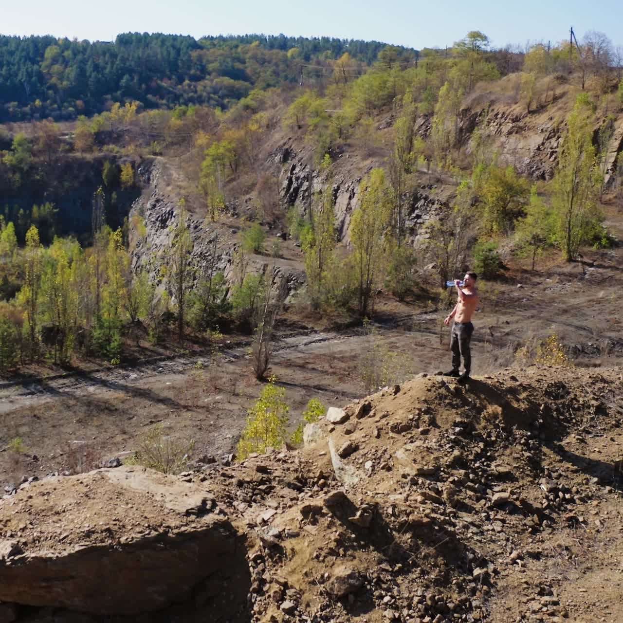 . Sportsman workout outdoor. Aerial view of young sportsman on nature