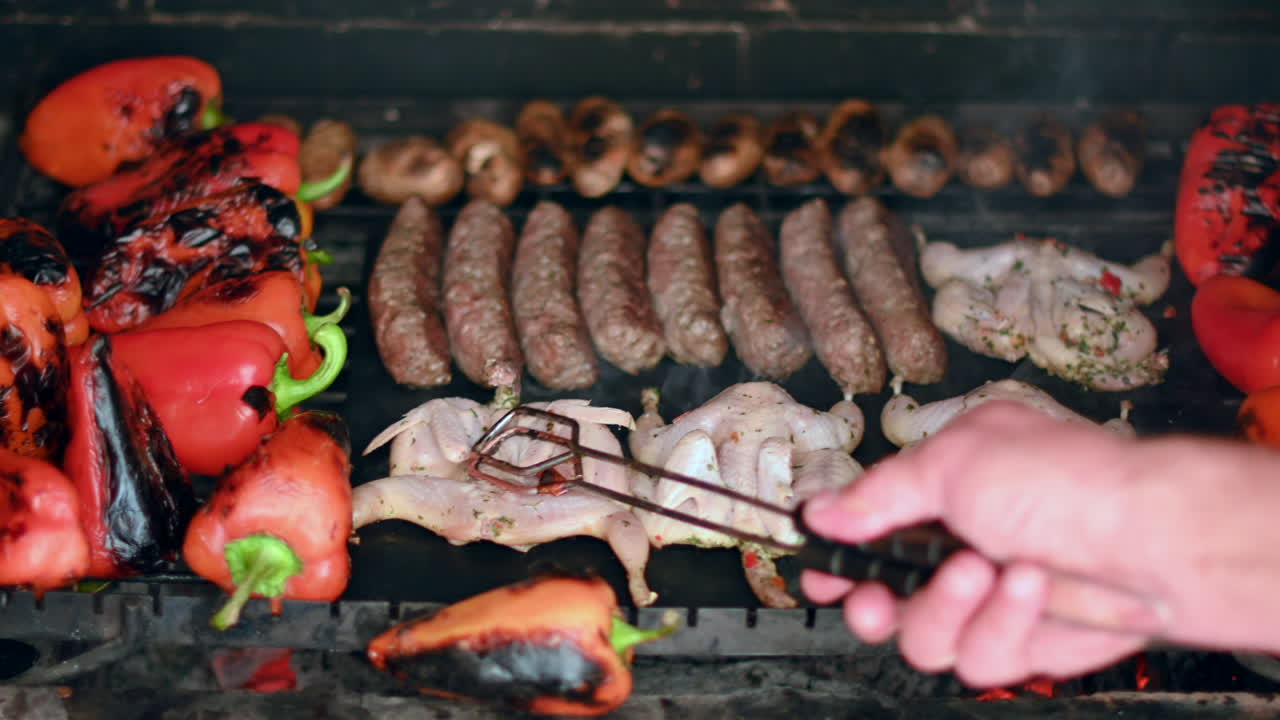 Bbq beef and quail meat on grill with vegetables