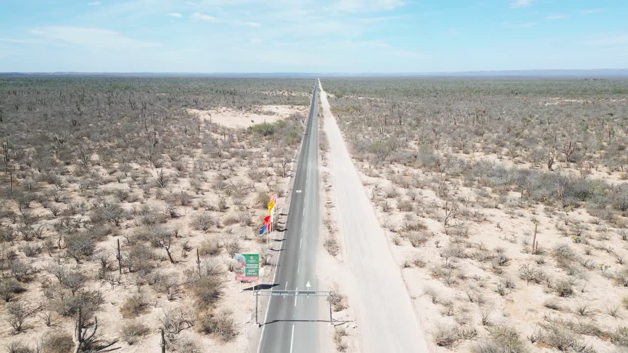 Endless desert road in El Mogote, Baja California Sur, captured from above