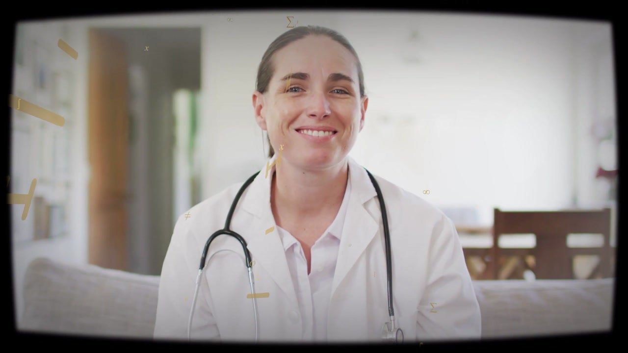 Female doctor wearing lab coat on sofa speaking gesturing golden marks appearing obscuring advising