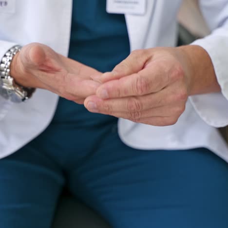 Doctor using hand sign while talking