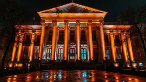 orange illuminated historic building at night