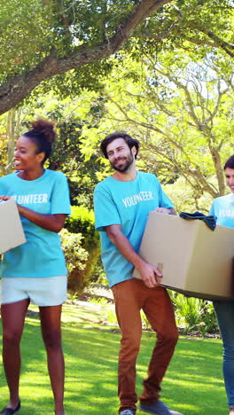 group of volunteer holding cartons