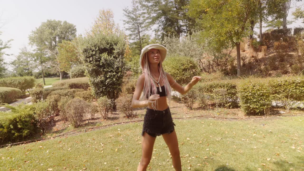 Woman playing in the park