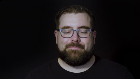 motion studio portrait of a bearded man enjoying a delicious cup of coffee