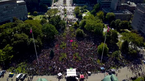 massive protest in ottawa: aerial view of a large crowd gathering