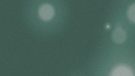 animación de puntos de luz sobre fondo verde