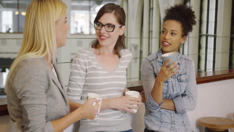 women listening to their colleague