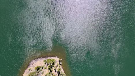 Birds-eye-view-of-a-colorado-lake-and-tiny-island-in-the-middle