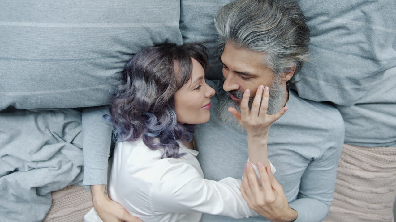 Couple Lying in Bed