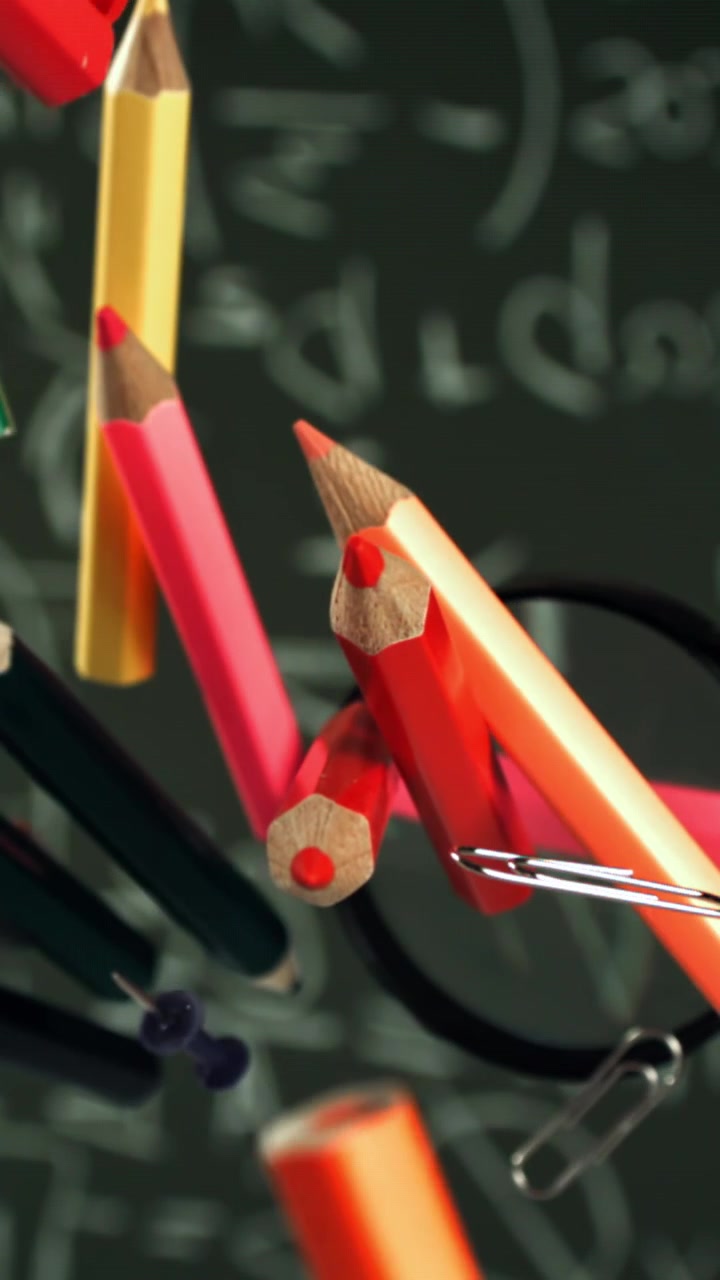 Colorful School Supplies Floating Against a Chalkboard with Math Equations