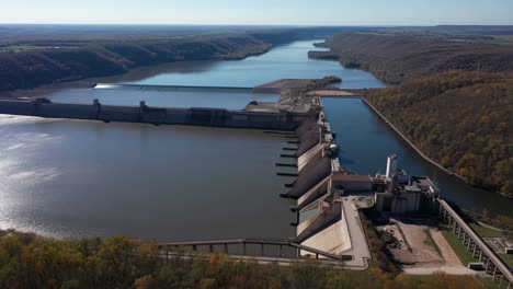 aerial view of a large hydroelectric dam and reservoir