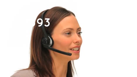 Animation-of-changing-numbers-over-woman-wearing-phone-headsets